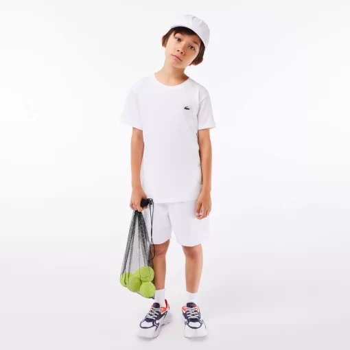 Lacoste Jungenkleidung>Atmungsaktives Jungen T-Shirt Sport Weis 001