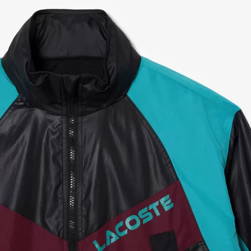 Lacoste Jacken & Mäntel>Extragrose Colourblock-Jacke Mit Kapuze Und Verstellbarem Bund Schwarz / Blau / Burgunder Kri