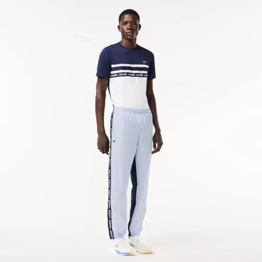 Lacoste Tennis>Gefutterte Tennis Trainingshosen Hellblau / Navy Blau X1J