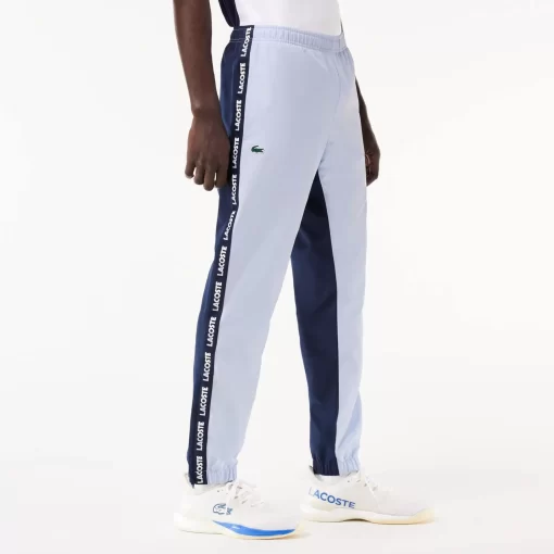 Lacoste Tennis>Gefutterte Tennis Trainingshosen Hellblau / Navy Blau X1J