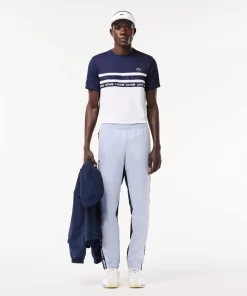 Lacoste Tennis>Gefutterte Tennis Trainingshosen Hellblau / Navy Blau X1J