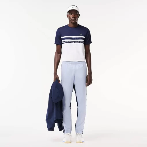 Lacoste Tennis>Gefutterte Tennis Trainingshosen Hellblau / Navy Blau X1J