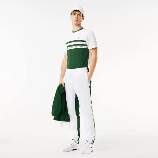 Lacoste Tennis>Gefutterte Tennis Trainingshosen Weis / Grun 737