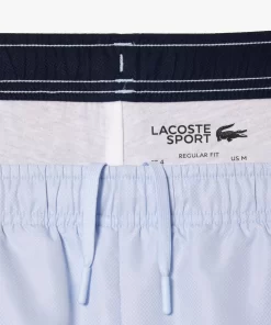 Lacoste Tennis>Gefutterte Tennis Trainingshosen Hellblau / Navy Blau X1J