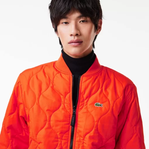 Lacoste Jacken & Mäntel>Gesteppte Herren-Wende-Bomberjacke Schwarz / Orange Qxi