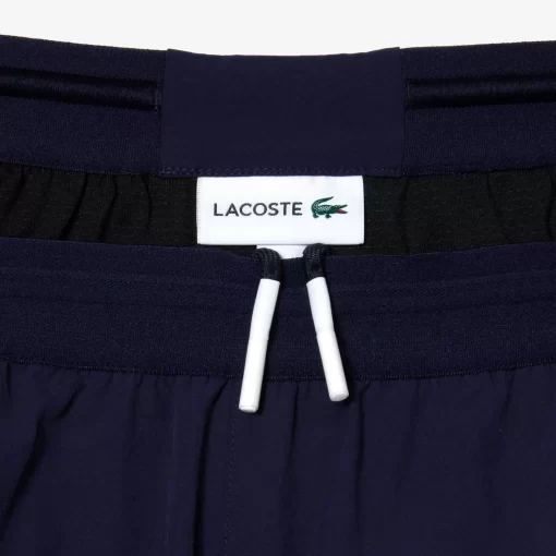 Lacoste Badebekleidung>Herren Badehose Aus Recyceltem Polyamid Mit Colourblock Navy Blau / Grun / Weis Yun