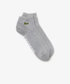 Lacoste Sportbekleidung>Herren Sport Baumwollsocken Aus Stretch-Baumwolle Mit Logo Heidekraut Grau / Weis Mtg