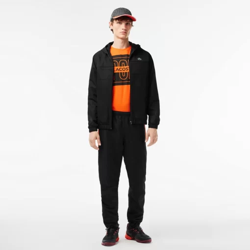 Lacoste Sportbekleidung>Herren Sport French Capsule Trainingshose Schwarz / Weis / Orange Lji