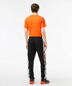 Lacoste Sportbekleidung>Herren Sport French Capsule Trainingshose Schwarz / Weis / Orange Lji