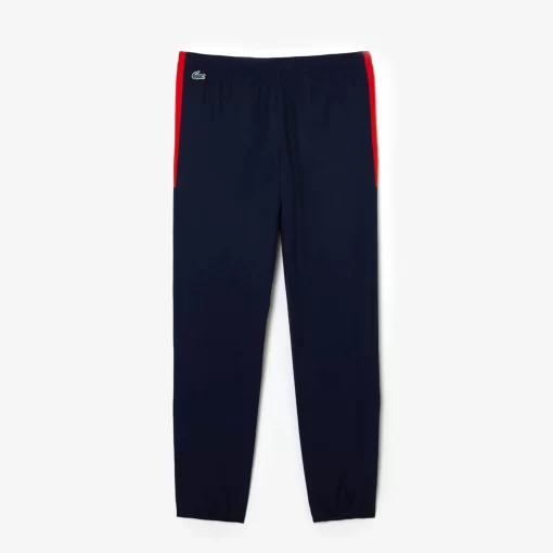 Lacoste Sportbekleidung>Herren Sport French Capsule Trainingshose Navy Blau / Rot / Weis 9Re