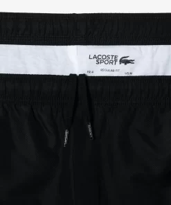 Lacoste Sportbekleidung>Herren Sport French Capsule Trainingshose Schwarz / Weis / Orange Lji