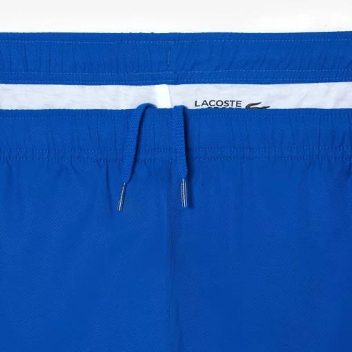 Lacoste Sportbekleidung>Herren Sport French Capsule Trainingshose Blau / Orange / Weis U4I