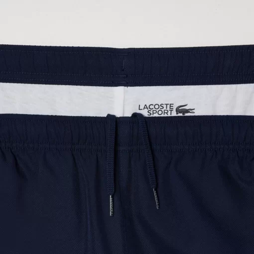 Lacoste Sportbekleidung>Herren Sport French Capsule Trainingshose Navy Blau / Rot / Weis 9Re