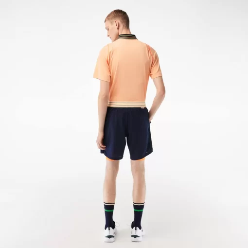 Lacoste Tennis>Herren Sport French Open Edition Shorts Navy Blau / Orange 7Yd