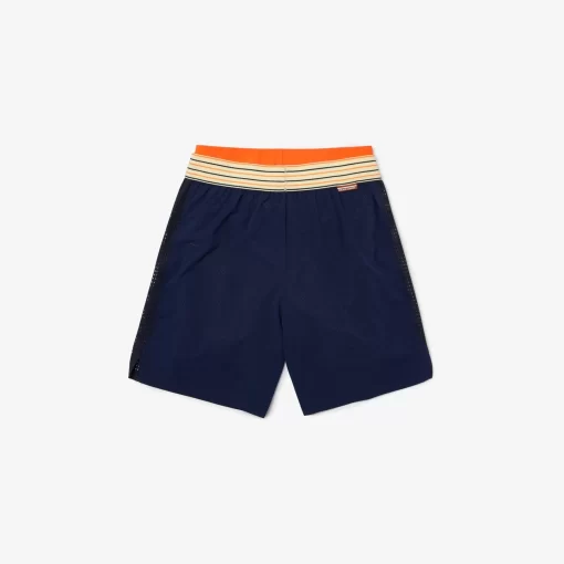 Lacoste Tennis>Herren Sport French Open Edition Shorts Navy Blau / Orange 7Yd