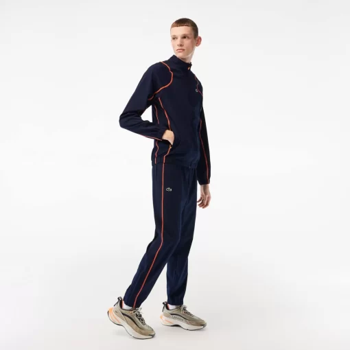 Lacoste Tennis>Herren Tennis Jogger-Set Navy Blau / Orange Xig