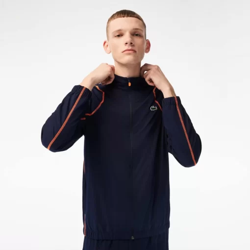 Lacoste Tennis>Herren Tennis Jogger-Set Navy Blau / Orange Xig