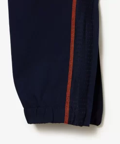 Lacoste Tennis>Herren Tennis Jogger-Set Navy Blau / Orange Xig