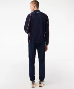 Lacoste Tennis>Herren Tennis Jogger-Set Navy Blau / Orange Xig