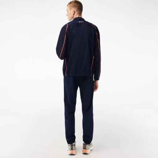 Lacoste Tennis>Herren Tennis Jogger-Set Navy Blau / Orange Xig