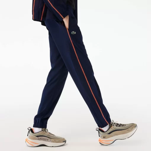 Lacoste Tennis>Herren Tennis Jogger-Set Navy Blau / Orange Xig