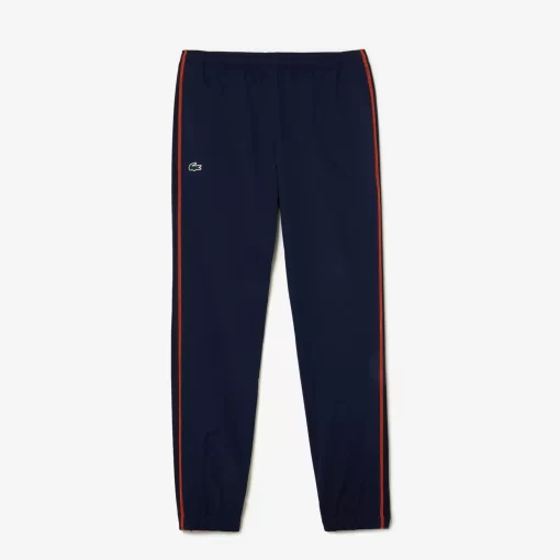 Lacoste Tennis>Herren Tennis Jogger-Set Navy Blau / Orange Xig