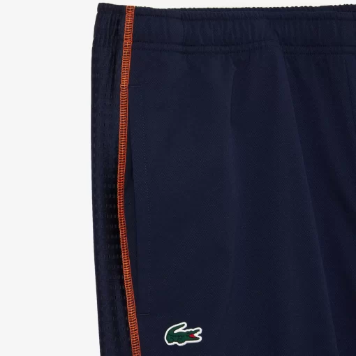 Lacoste Tennis>Herren Tennis Jogger-Set Navy Blau / Orange Xig