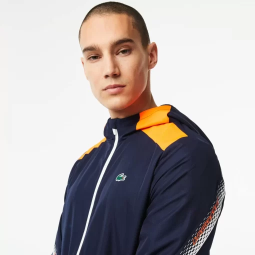 Lacoste Tennis>Herren Tennis Kapuzenjacke Aus Recyceltem Polyester Navy Blau / Orange / Weis / Orange / Weis Ag4