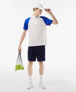 Lacoste Tennis>Herren Tennis Poloshirt Aus Recyceltem Polyester Weis / Blau / Orange 9Tg