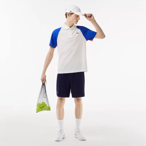 Lacoste Tennis>Herren Tennis Poloshirt Aus Recyceltem Polyester Weis / Blau / Orange 9Tg