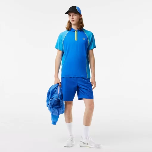 Lacoste Tennis>Herren Tennis Poloshirt Aus Recyceltem Polyester Mit Ultra-Dry-Technologie Blau / Gelb Aw9