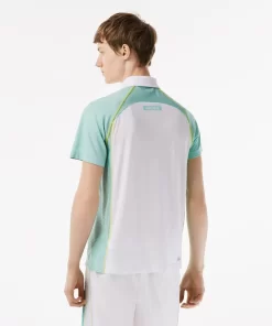 Lacoste Tennis>Herren Tennis Poloshirt Aus Recyceltem Polyester Mit Ultra-Dry-Technologie Weis / Hellgrun / Gelb Awc