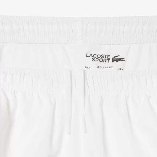 Lacoste Tennis>Herren Trainingshosen Weis / Gelb Wiw