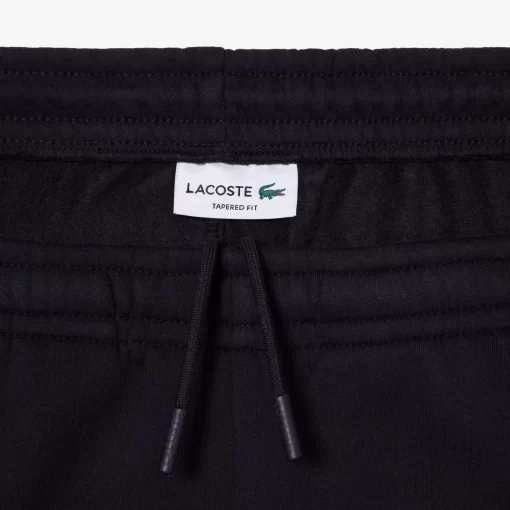 Lacoste Hosen & Shorts>Herren Trainingshosen Mit Logo Und Kontraststreifen Navy Blau / Heidekraut Grau E6A