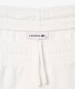 Lacoste Hosen & Shorts>Jogger Trainingshosen Aus Baumwolle Mit Tennis-Print Weis 70V