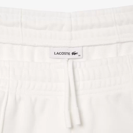 Lacoste Hosen & Shorts>Jogger Trainingshosen Aus Baumwolle Mit Tennis-Print Weis 70V