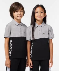 Lacoste Jungenkleidung>Kinder Poloshirt Aus Bio-Baumwoll-Pique Mit Colourblock Heidekraut Grau / Schwarz 80P