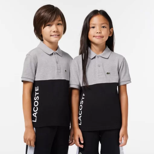 Lacoste Jungenkleidung>Kinder Poloshirt Aus Bio-Baumwoll-Pique Mit Colourblock Heidekraut Grau / Schwarz 80P