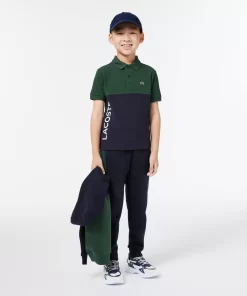 Lacoste Jungenkleidung>Kinder Poloshirt Aus Bio-Baumwoll-Pique Mit Colourblock Dunkelgrun / Navy Blau Kzi