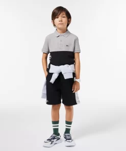 Lacoste Jungenkleidung>Kinder Poloshirt Aus Bio-Baumwoll-Pique Mit Colourblock Heidekraut Grau / Schwarz 80P