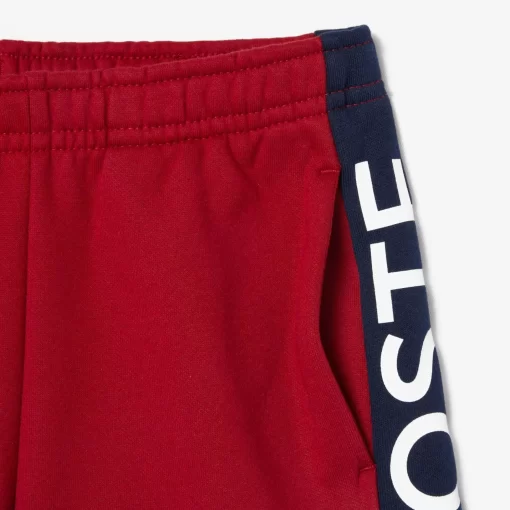 Lacoste Mädchenkleidung>Kinder Shorts Aus Bio-Baumwolle Mit Farbstreifen Burgunder / Navy Blau Iqf