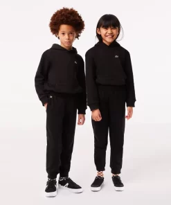 Lacoste Mädchenkleidung>Kinder Trainingshose Mit Colourblock Schwarz 031