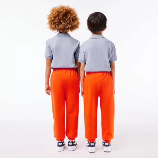 Lacoste Mädchenkleidung>Kinder Trainingshose Mit Colourblock Orange Sji