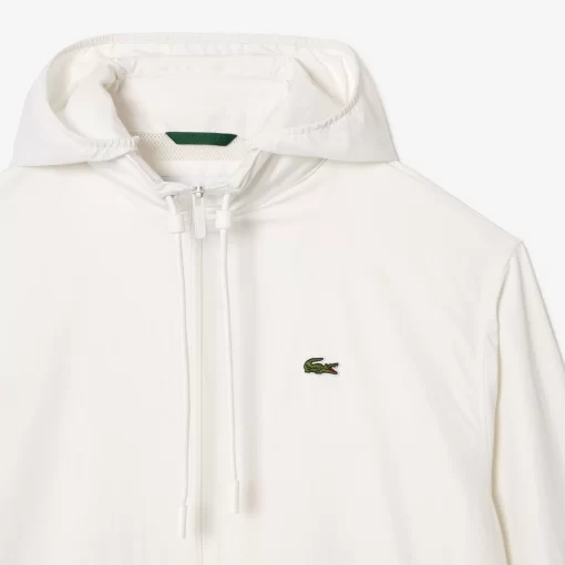 Lacoste Jacken & Mäntel>Kurze Wasserabweisende Trainings-Jacke Mit Abnehmbarer Kapuze Weis 70V