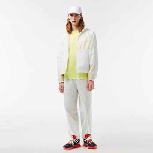 Lacoste Jacken & Mäntel>Kurze, Wasserfeste Trainingsjacke In Patchwork Weis Qim