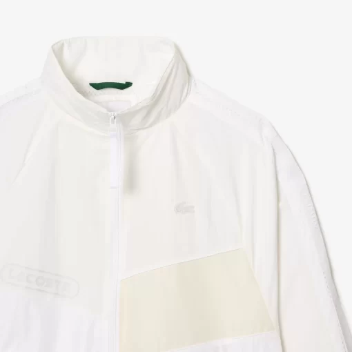 Lacoste Jacken & Mäntel>Kurze, Wasserfeste Trainingsjacke In Patchwork Weis Qim