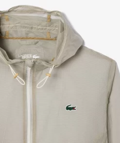 Lacoste Sportbekleidung>Leichte Wasserfeste Sportjacke Mit Kapuze Creme Xfj