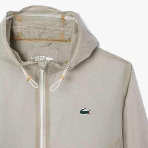 Lacoste Sportbekleidung>Leichte Wasserfeste Sportjacke Mit Kapuze Creme Xfj