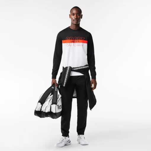 Lacoste Tennis>Ripstop Tennis Sweatshirt Schwarz / Orange / Weis Liz