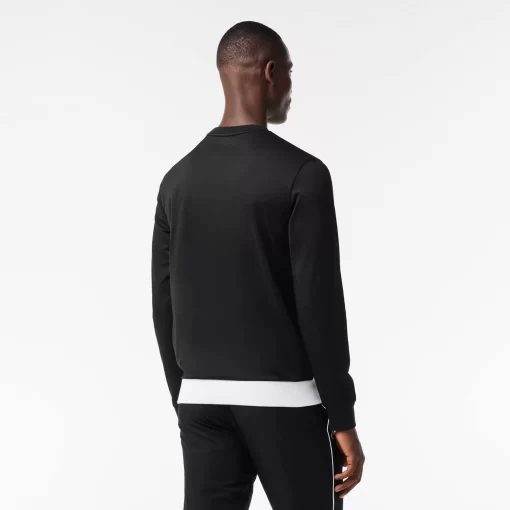 Lacoste Tennis>Ripstop Tennis Sweatshirt Schwarz / Orange / Weis Liz